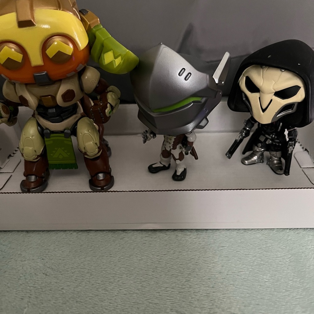 Funko Pops: ORISA, Jenji and Reaper.
